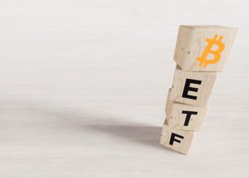 Exchange Traded Fund (ETF) and Bitcoin cryptodivisa concept. Introduce the concept of digital money background. Wooden vertical cube with bitcoin icon standing with "ETF" text. White background, 3D