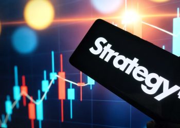 Cryptocurrency trading strategy on mobile device with stock market graph