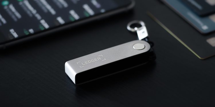 ZAPORIZHIA, UKRAINE SEPTEMBER 24, 2022 Crypto hardware wallet Ledger Nano X.