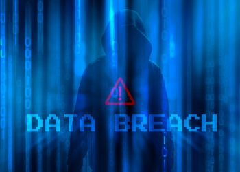 Ransomware concept. Abstract digital background with anonymous man of hacker in binary code and wording DATA BREACH with warning sign. Hack and science fiction. Matrix background with cybersecurity